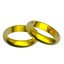 Two gold wedding rings isolated on white.